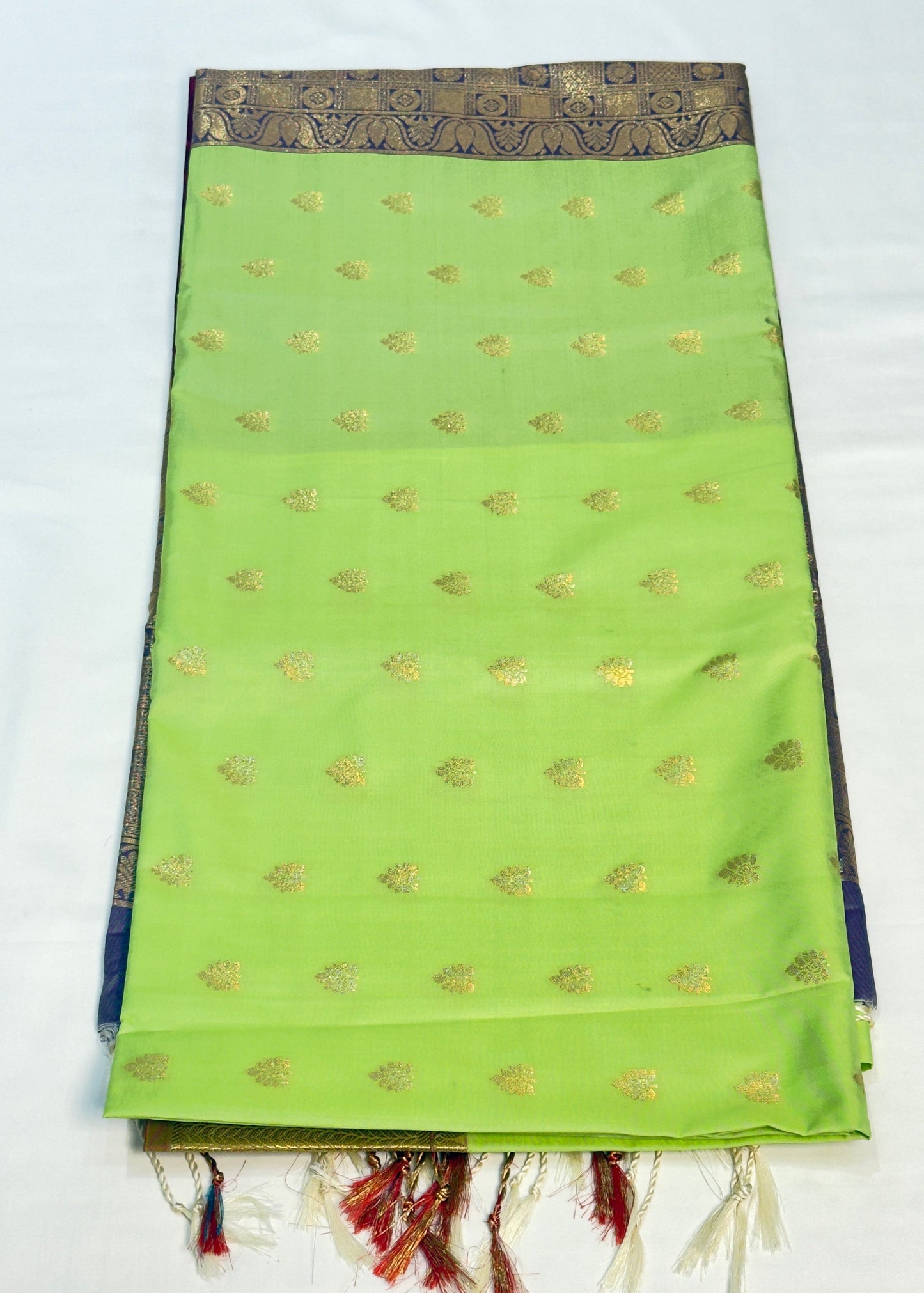 Pure soft silk light green saree with violet pallu